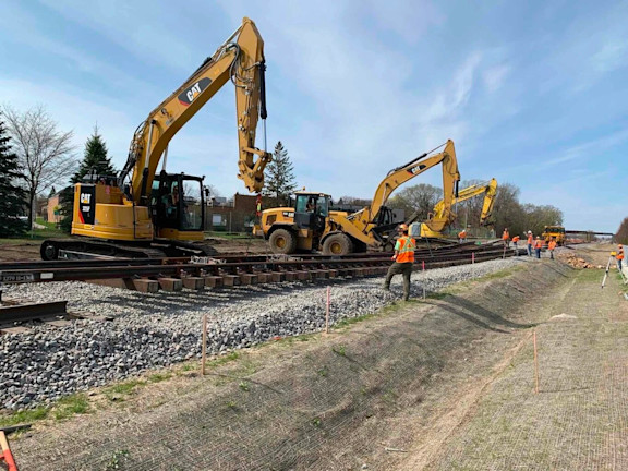 rail track being placed and set up on the ballast bed