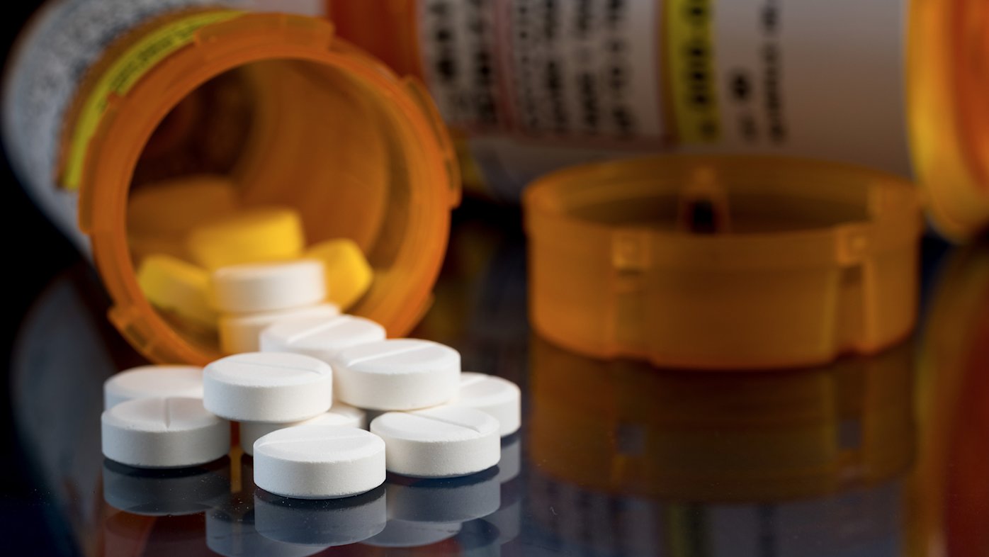 Pill bottle tipped will pills outside